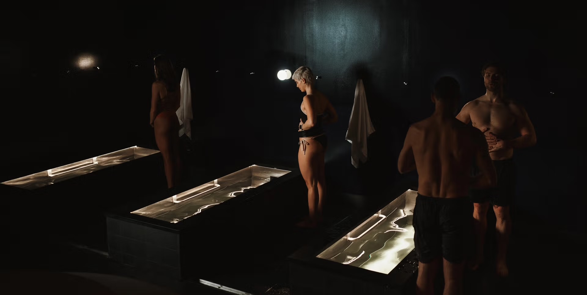 Cold plunge pools at Arc with dramatic lighting