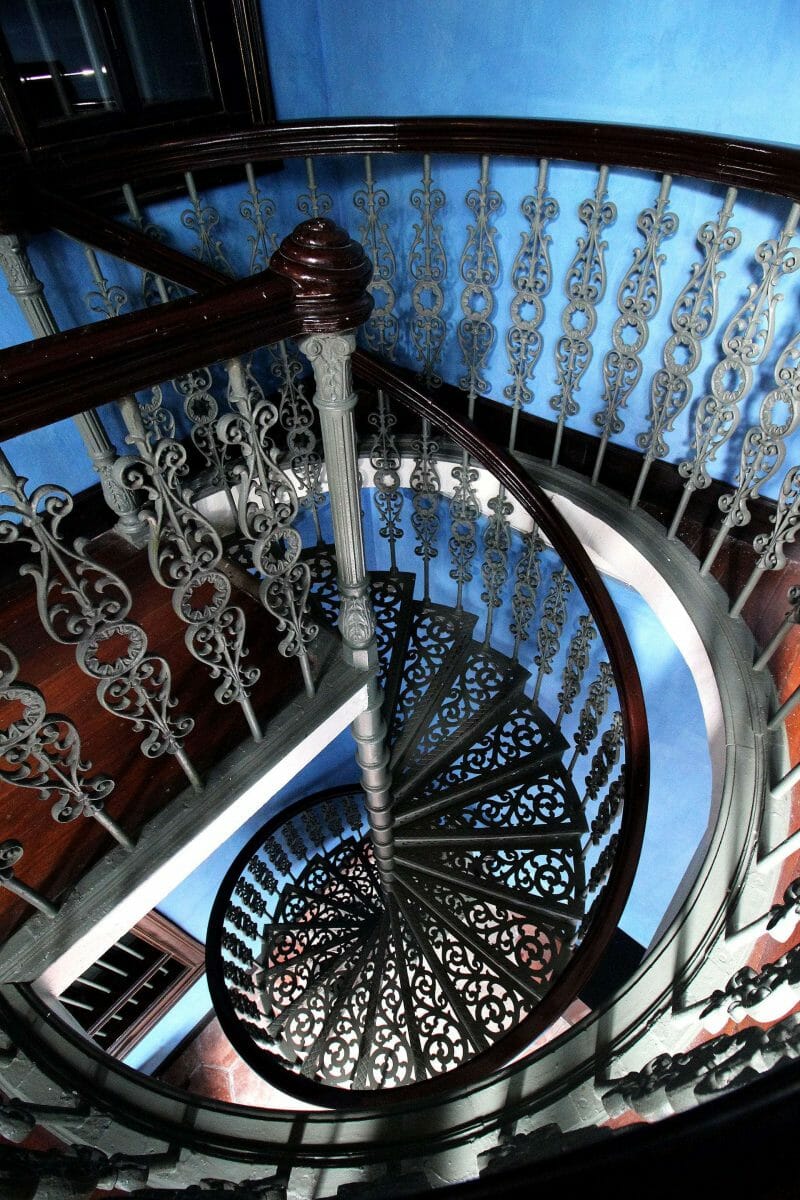 Spiral cast-iron staircase inside the Cheong Fatt Tze Mansion