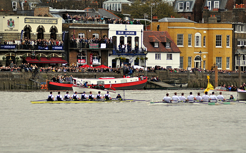 Boat Race crews racing on the Thames