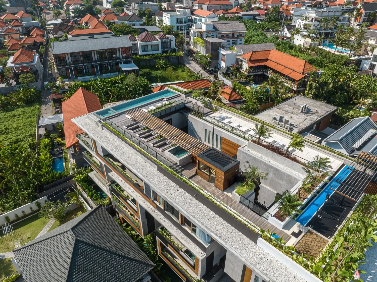 Aerial view of The Body Factory Property showing rooftop pool and amenities in Canggu
