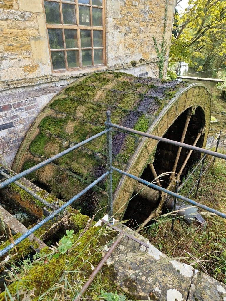 Mossy original water wheel still driving Donnington Brewery's machinery