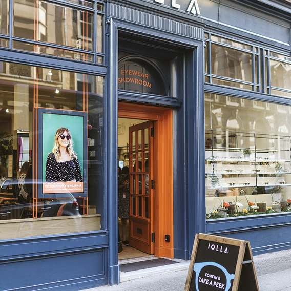 IOLLA showroom exterior — clear, restrained retail design