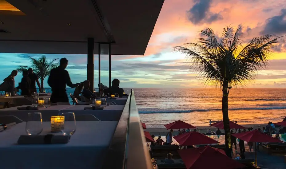 Mejekawi at Ku De Ta — interior dining room at sunset