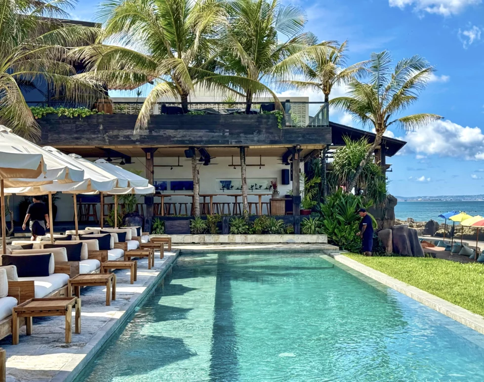 The Lawn Canggu pool area with tropical bar