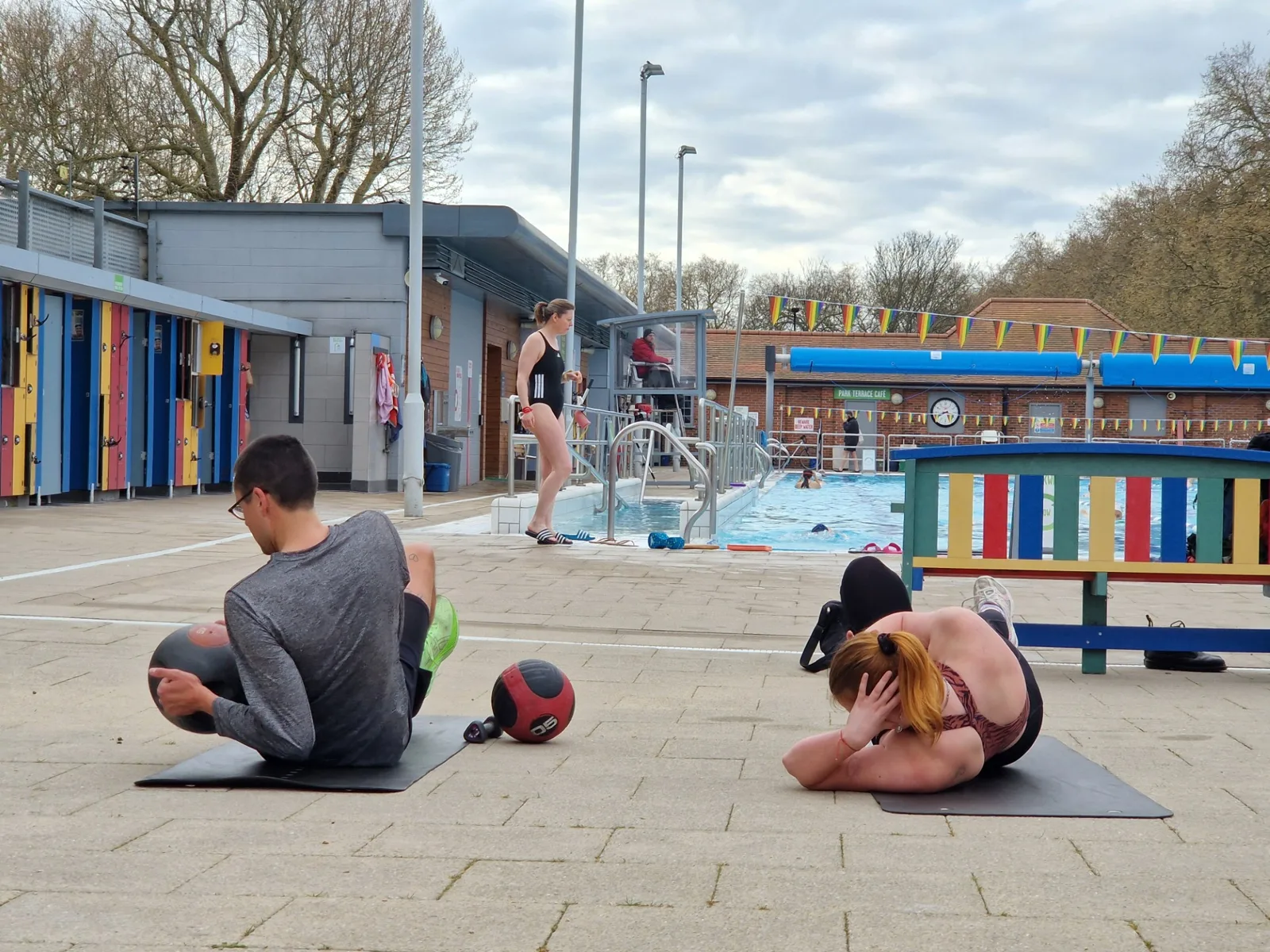 London Fields Lido — poolside training on the terrace beside the heated pool