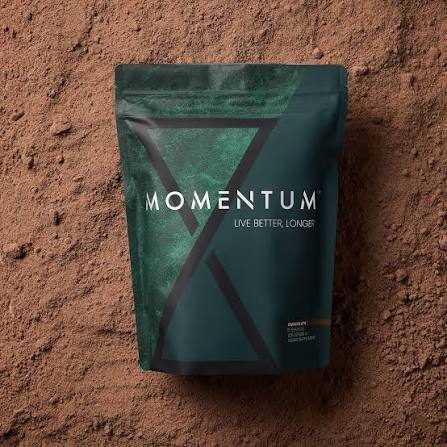 Momentum Longevity Shake chocolate bag on cocoa powder