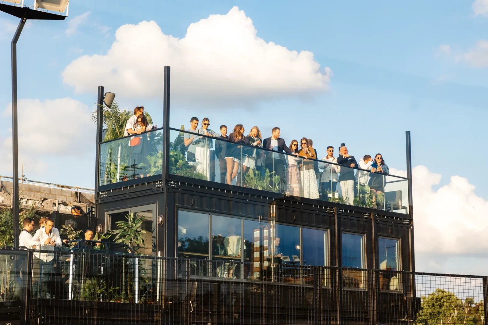 Padel Social Club Earl's Court — the rooftop terrace above the clubhouse against an open sky