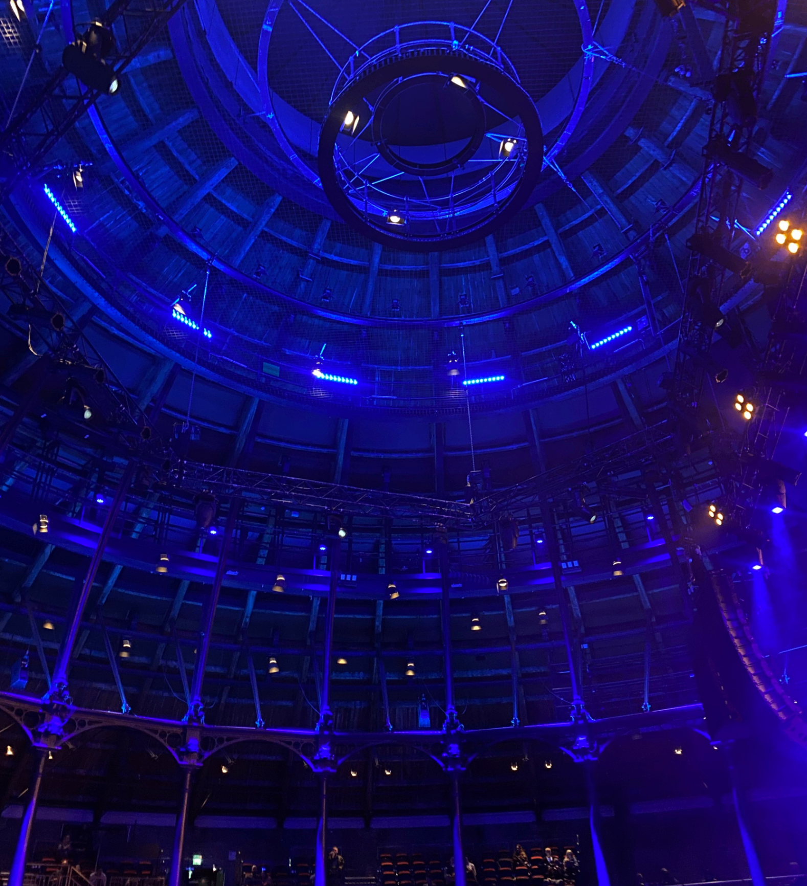 The Roundhouse dome interior illuminated in blue light during the performance