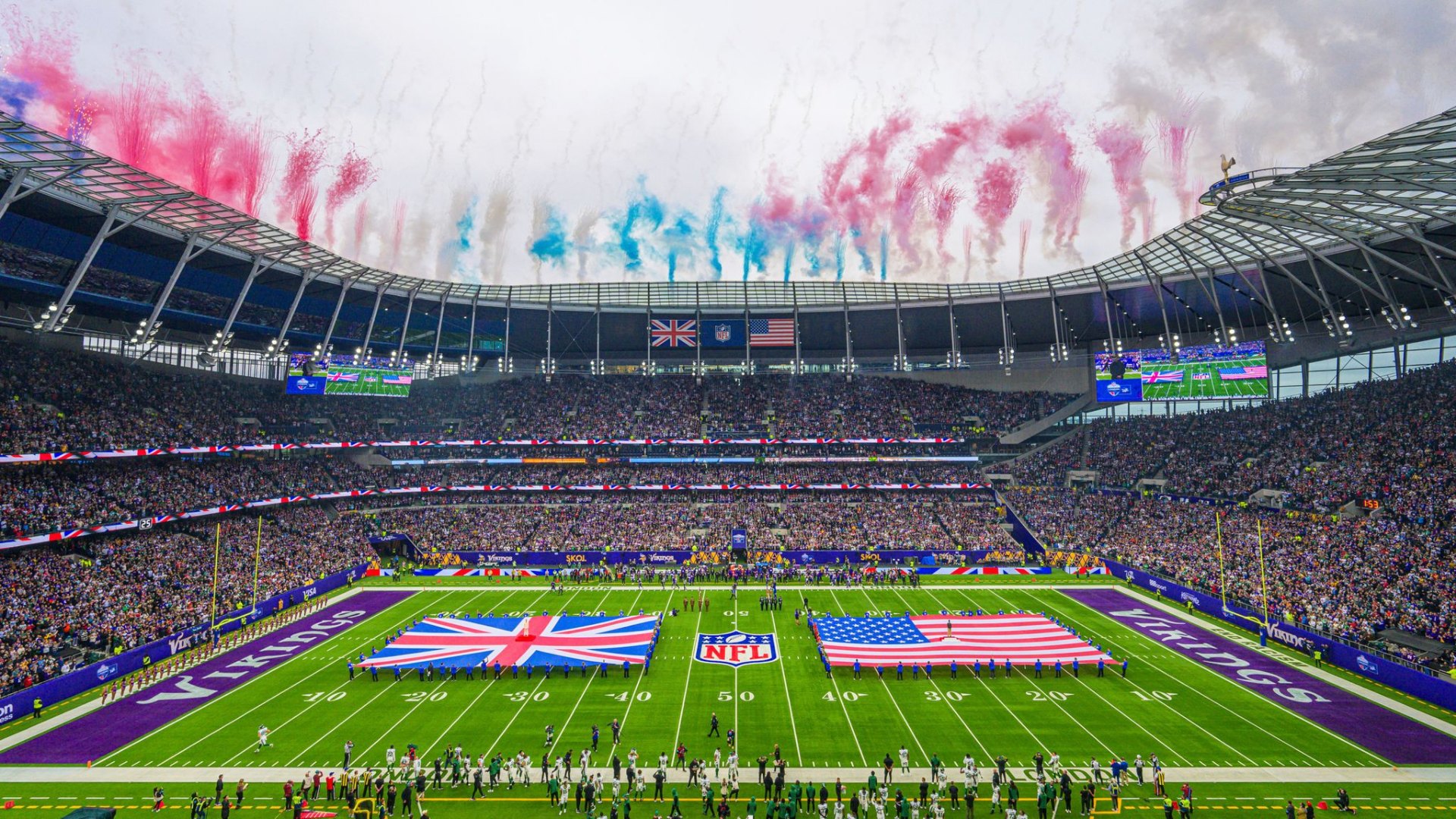 NFL game at Tottenham Hotspur Stadium with fireworks and flags