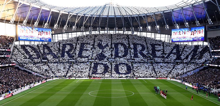 South Stand tifo display reading 'Dare Dream Do' before a match