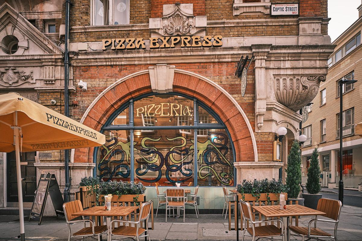 PizzaExpress — heritage pizzeria exterior with arched window